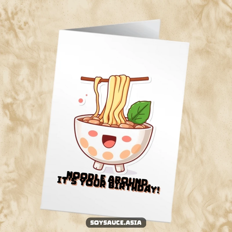 Funny Free Printable Birthday Card: Happy ramen bowl character with noodles playfully splashing out